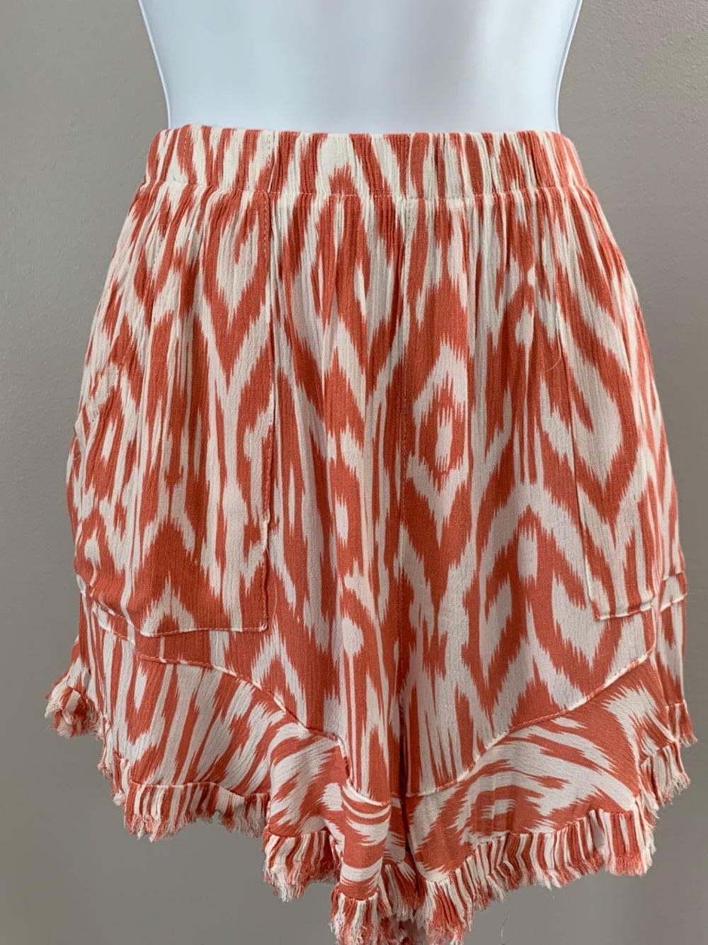 NWT Umgee Coral and Cream Ikat Ruffle Hem Shorts